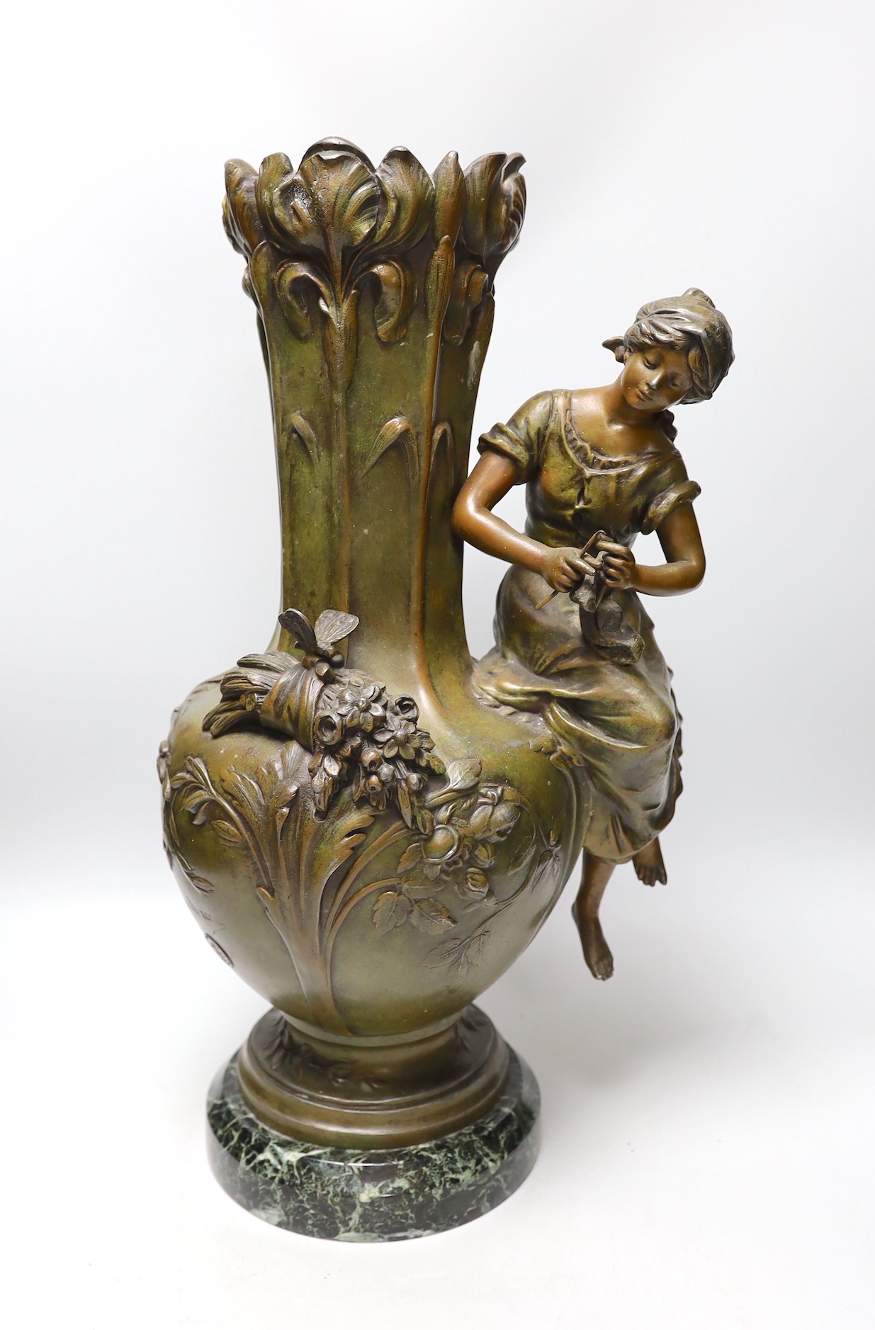 A French Art Nouveau patinated spelter figural vase, on marble stand, stamped Aug. Moreau with foundry stamp, 50cms